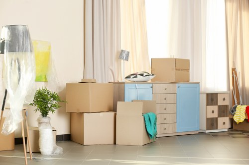 Removal team preparing a Docklands apartment move with lift access