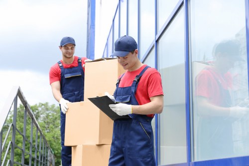 Movers assisting with a Docklands apartment relocation near the waterfront