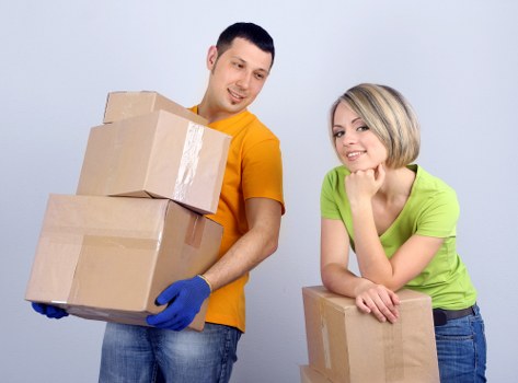 Packed office boxes and furniture ready for relocation in Docklands