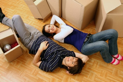 Careful packing of fragile household items for a Docklands move