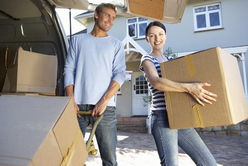Business moving team handling office furniture in Docklands