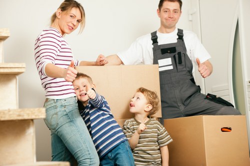 Packed office furniture and equipment ready for a Docklands business move