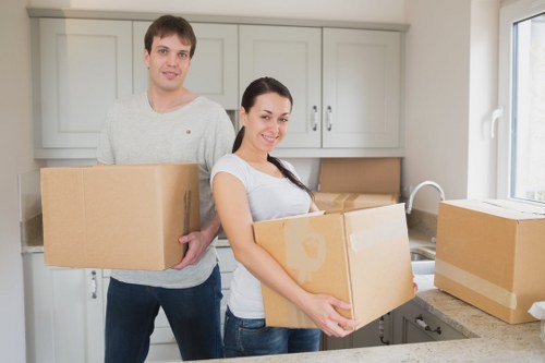 A local packing service preparing sturdy boxes for a Docklands move